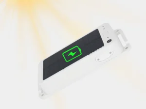 The GAT30 Solar asset tracker mounted on an orange shipping container, charging its battery with a built-in solar panel.