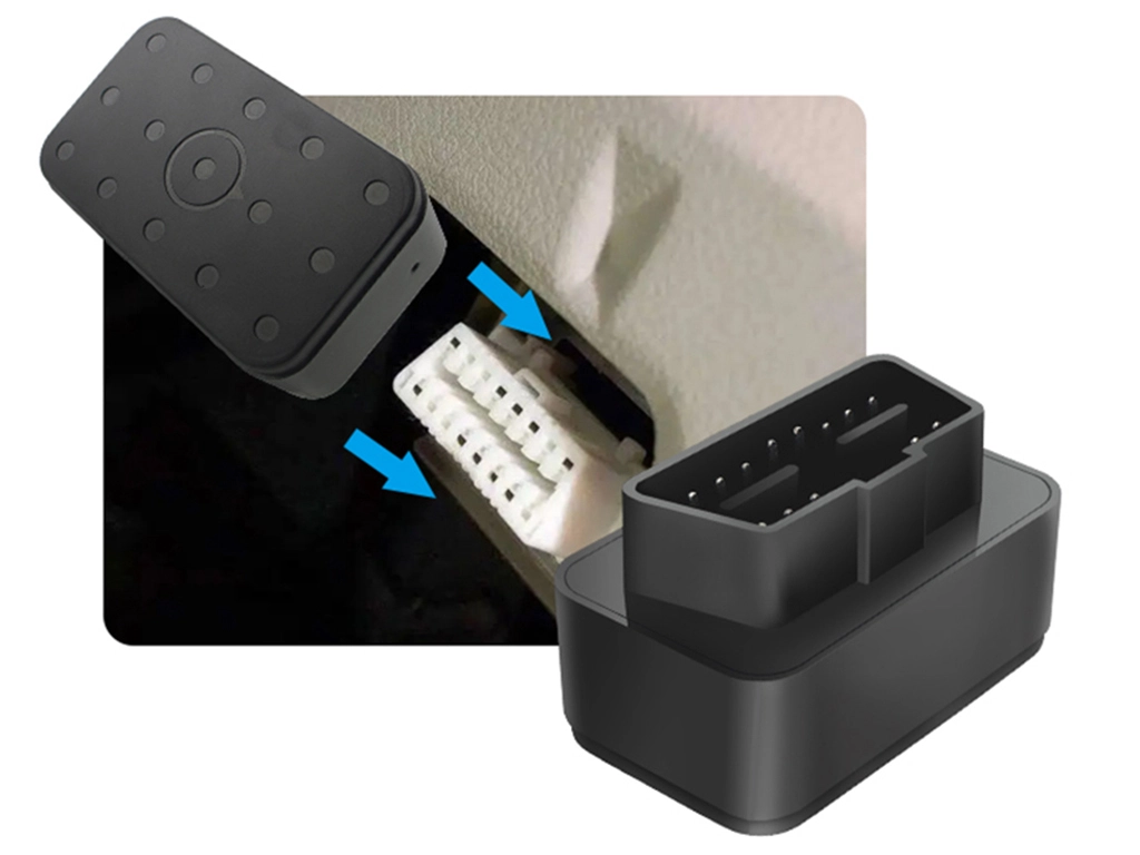 Installing a great will OBD tracker into a vehicle's diagnostic port.