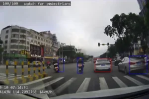 ADAS AI technology identifying vehicles and pedestrians on the road.