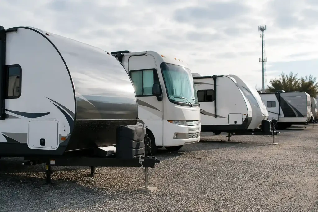 Rows of parked trailers at a logistics yard for trailer and RV asset visibility.