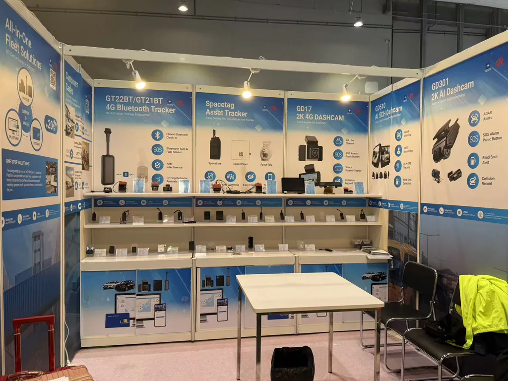 Trade show booth displaying fleet tracking devices and dashcams