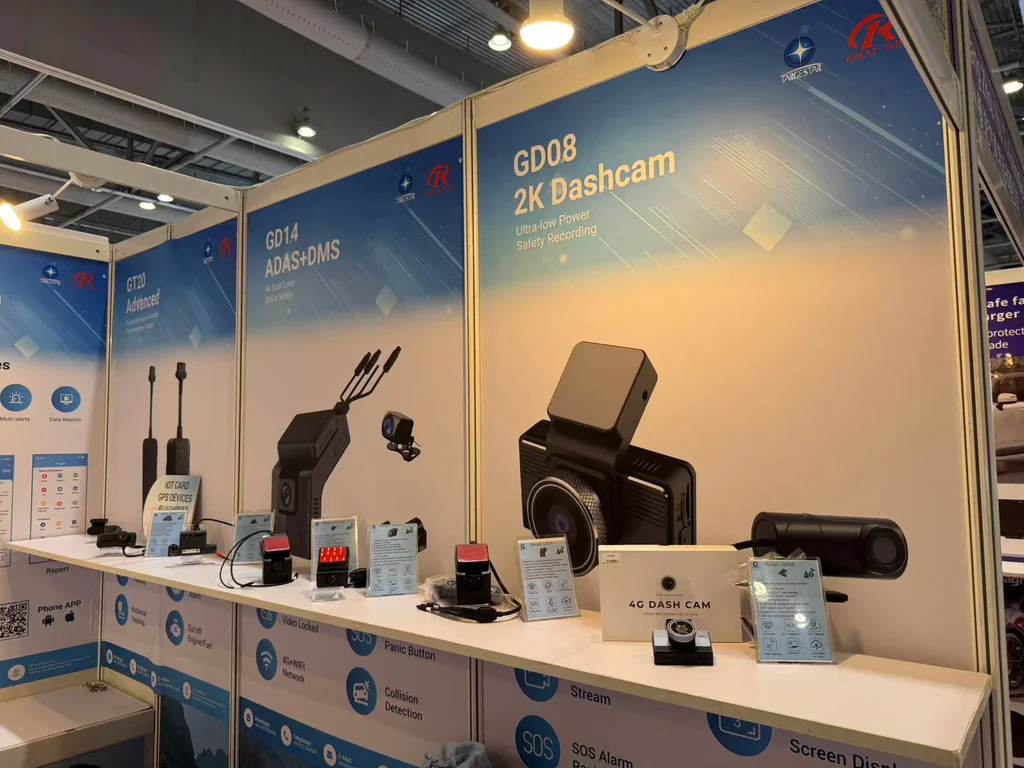 Trade show booth displaying dash cams and driver safety devices